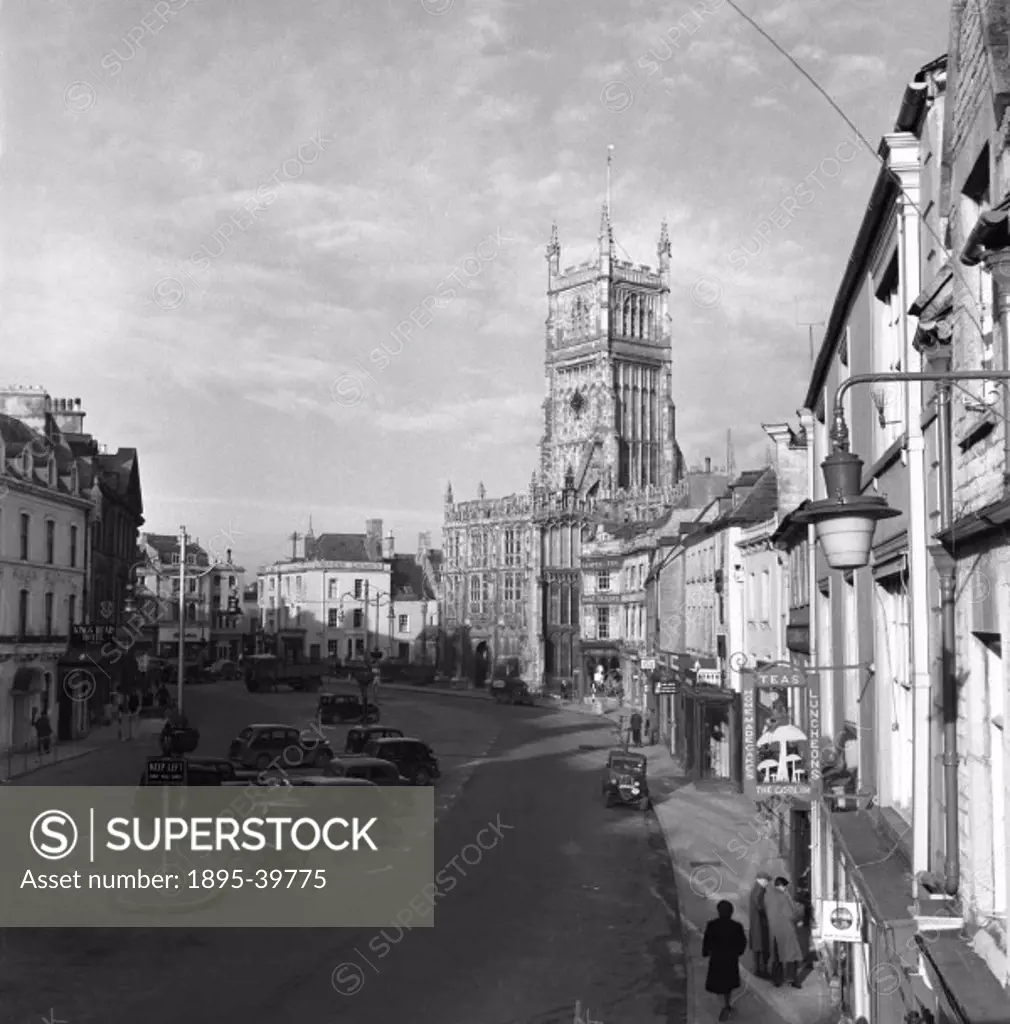 Main street in Cirencester, Gloucestershire, 1950.  This photograph, from a film, was taken to show the kinds of places people could get to by train a...