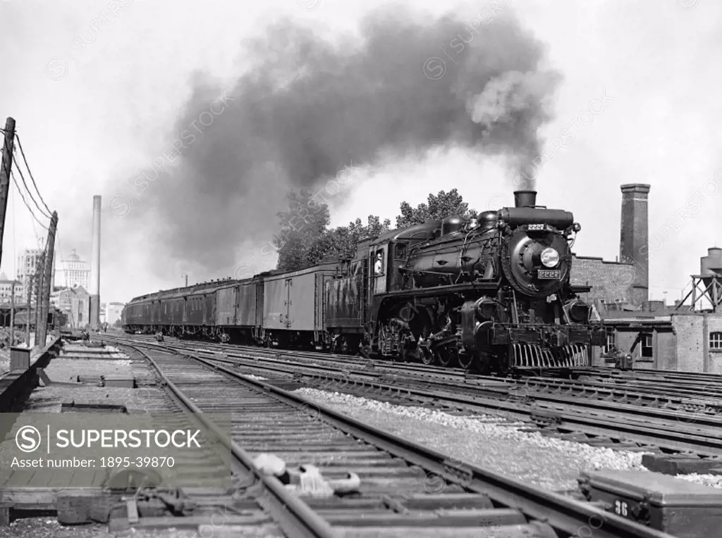 G1t class 4-6-2 No 2227 with a west bound passenger train having left Windsor station near Montreal, Quebec, Canada, by Godfrey Soole, 1936.  This tra...