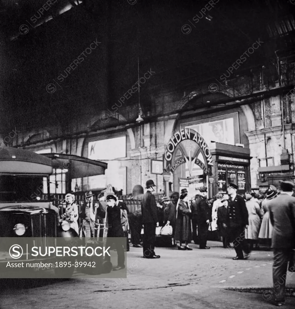 Entrance for Golden Arrow passengers, at Victoria station, London, about 1935.  The Golden Arrow was a Pullman train, which began running in 1929. It ...