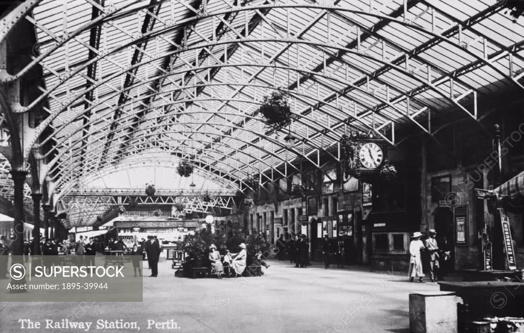 Concourse inside Perth station, about 1920. The photograph shows the ticket office and newsagency.   At this time the station was on the Caledonian Ra...