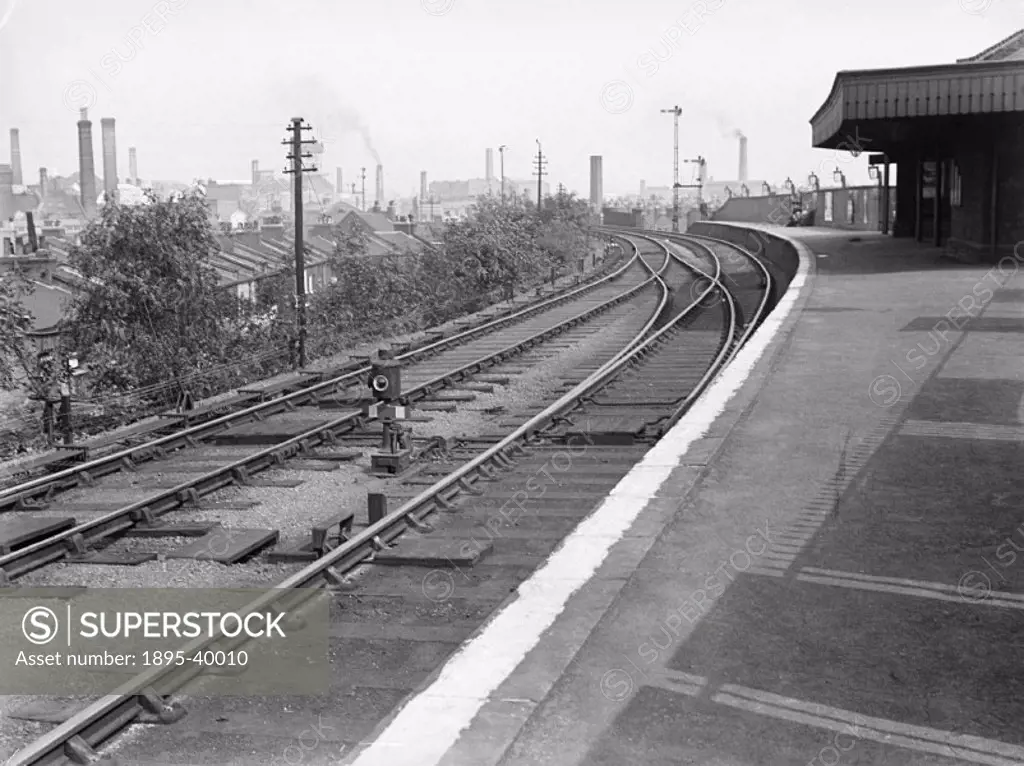 Victoria Park station, London, about 1911. This station is close to Victoria Dock, in London. It was used by passengers, and by freight trains which w...