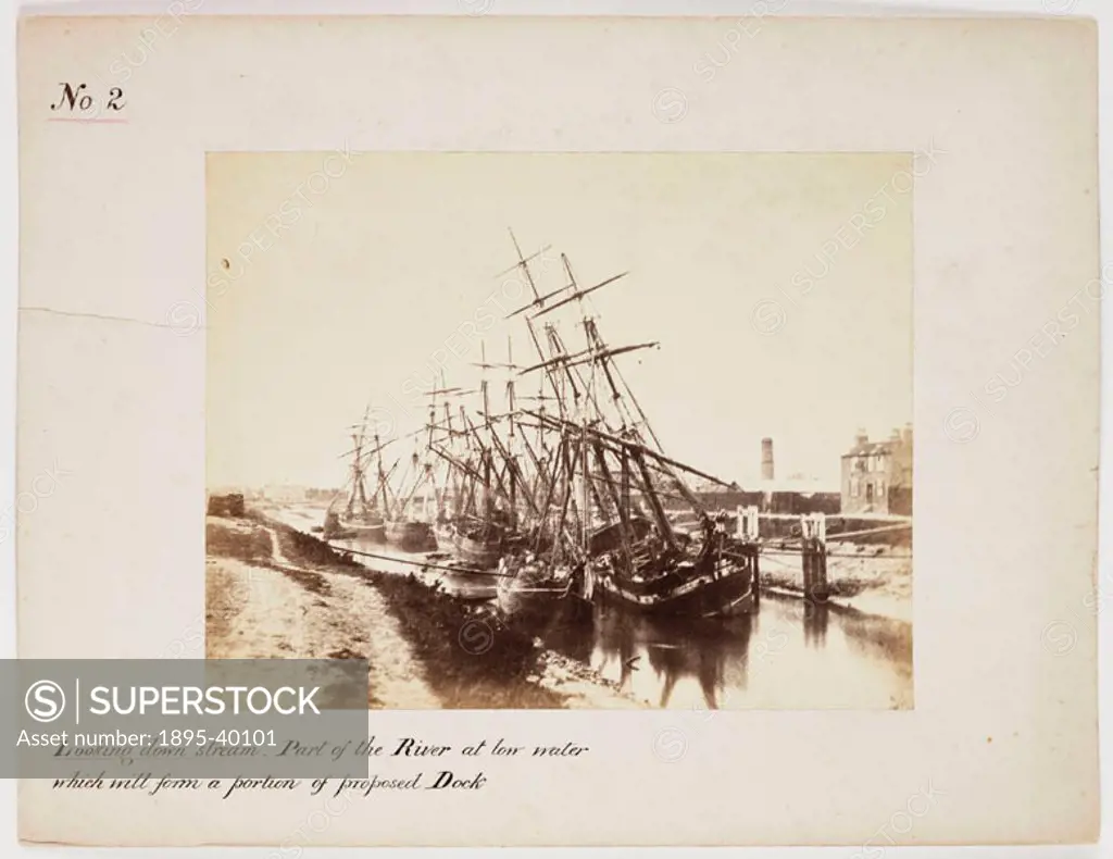 A photograph of sailing ships moored on the River Nene, in Wisbech, by Samuel Smith on 18 September, 1861. The ships are the ´Carolina´, ´Queen´, ´Ale...
