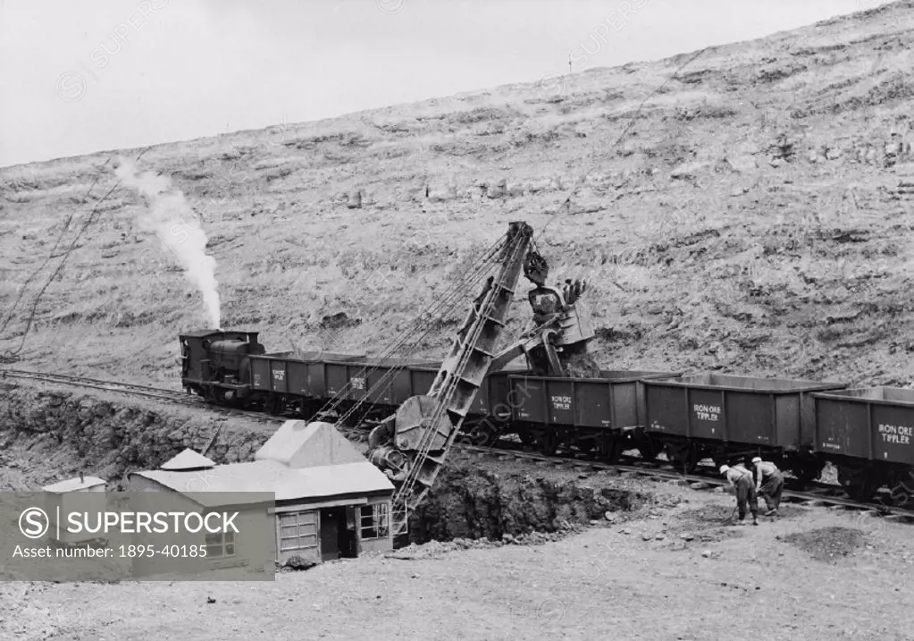 Tippler wagons with a 0-4-0T being filled from a walking drag line. Tippler wagons, used for the transport of minerals and ores, had no doors and were...