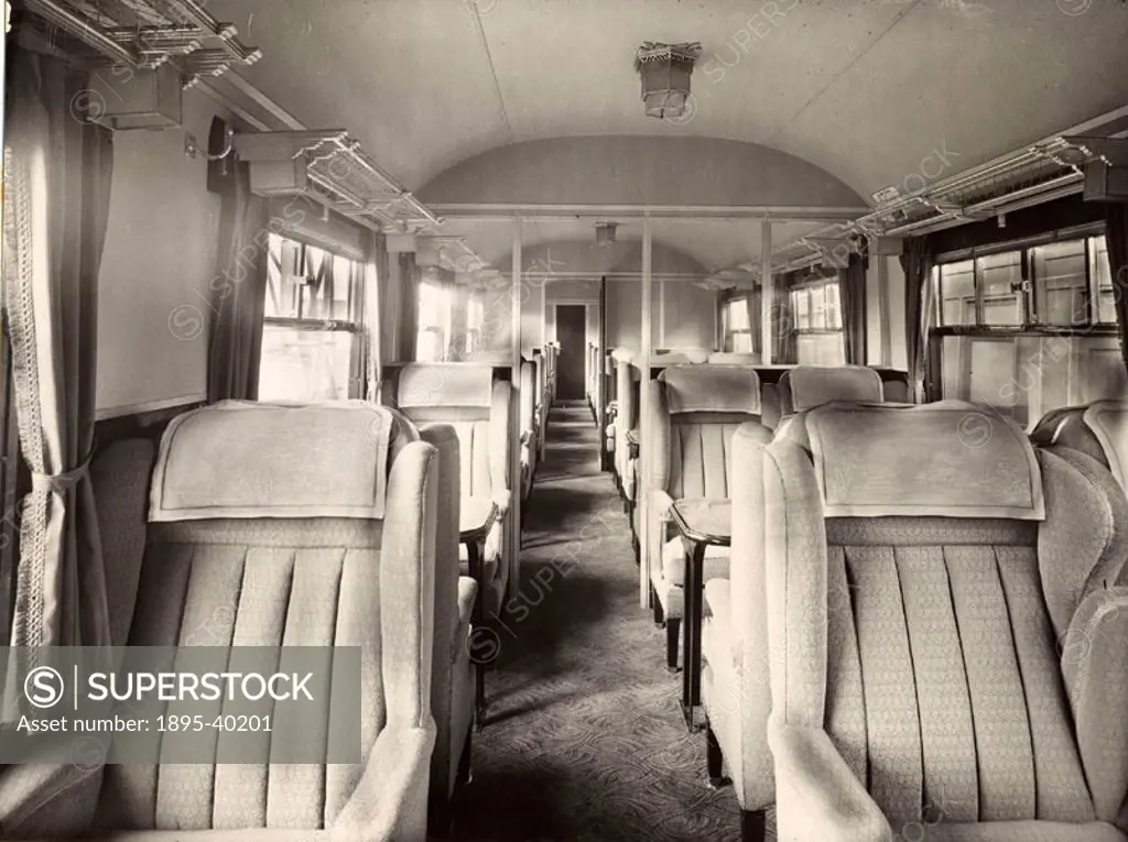 Inside a London & North Eastern Railway first class carriage, about 1938. This carriage was built at York Carriage works.  In the 1930s the railway co...