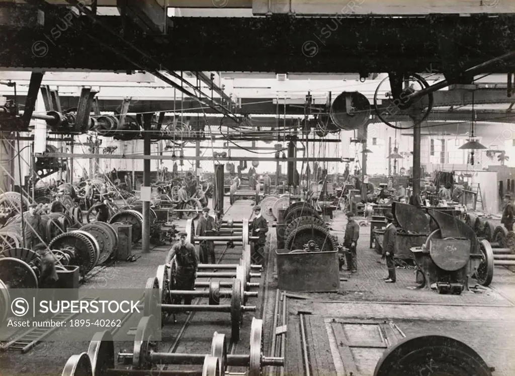 Workers in Doncaster carriage works wheelwright´s shop. This was where the wheels for carriages were made. The wheels have been made with a mould and ...