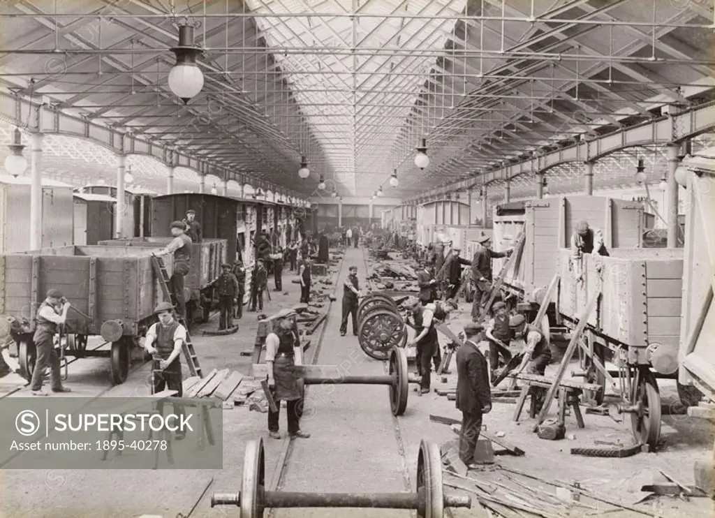Workers putting wagons together at Doncaster carriage and wagon works. At this time wagons were made from wood.  Doncaster works, known as the Plant ...
