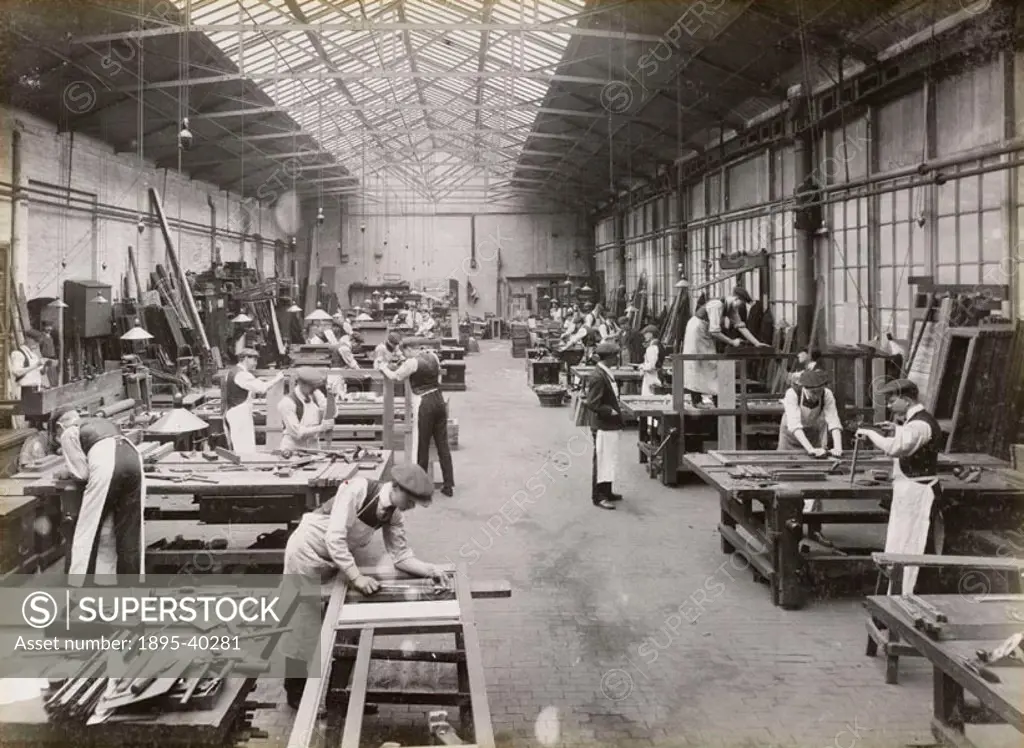 Workers constructing carriages at Doncaster carriage works. At this time carriages were made from wood but some were starting to be manufactured from ...