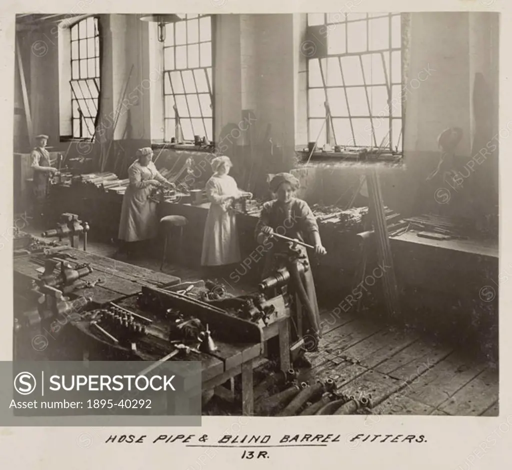 Women workers making barrels and hose pipes at Doncaster works. At this time there were fewer women working on the railways than men, and they were on...