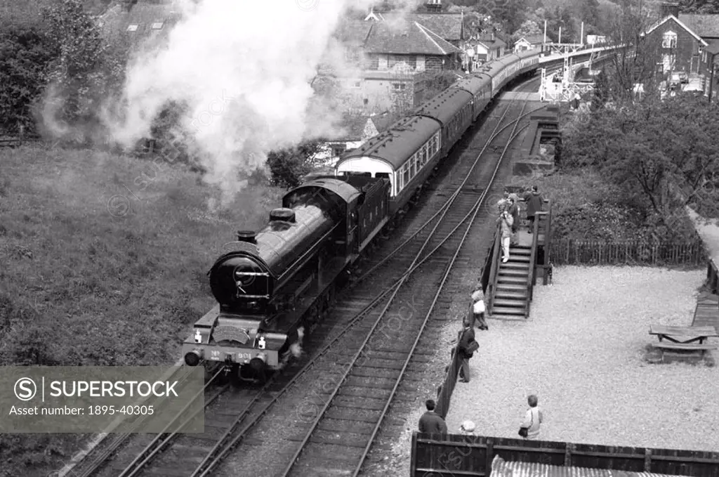 Passenger train, hauled by a Q7 class 0-8-0 locomotive number 901, on the North York Moors Railway. This locomotive was built at Darlington works, in ...