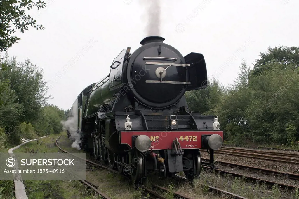 LNER steam locomotive 4-6-2 No 4472 Flying Scotsman’ at Scarborough. The Flying Scotsman was the first express passenger locomotive. It was built by ...