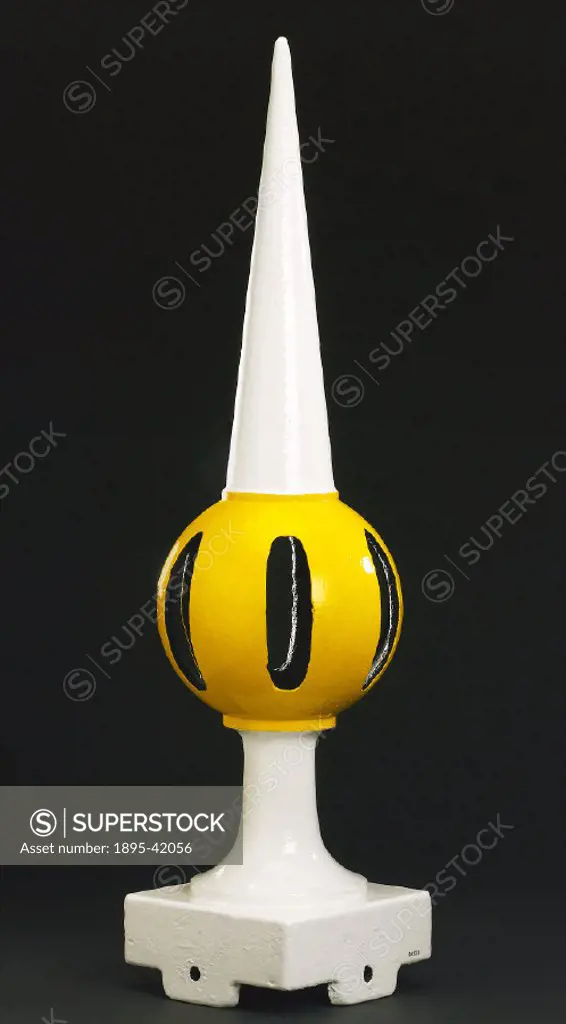 Cast iron signal finial painted yellow and white, from the Great Western Railway (GWR).