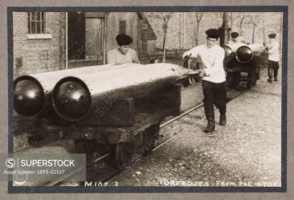 A photograph of sailors moving torpedoes,  taken by an unknown photographer in about 1916. This photograph is from an album entitled ´Britain Prepared...