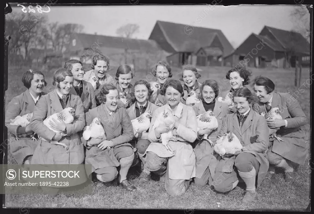 Photograph by James Jarche of a group of girls on Mrs Harnson Bells farm.