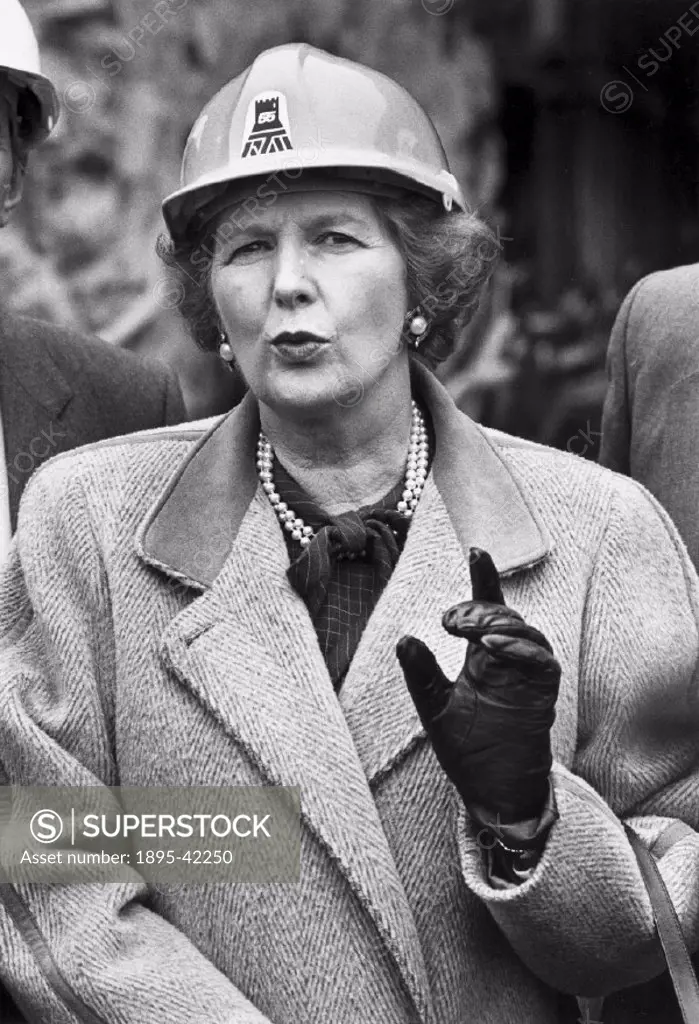 Mrs Thatcher in a hard hat at Pennenbach Tunnel, North Wales’. Margaret Hilda Thatcher (b 1925) studied chemistry at Oxford University, and worked as...