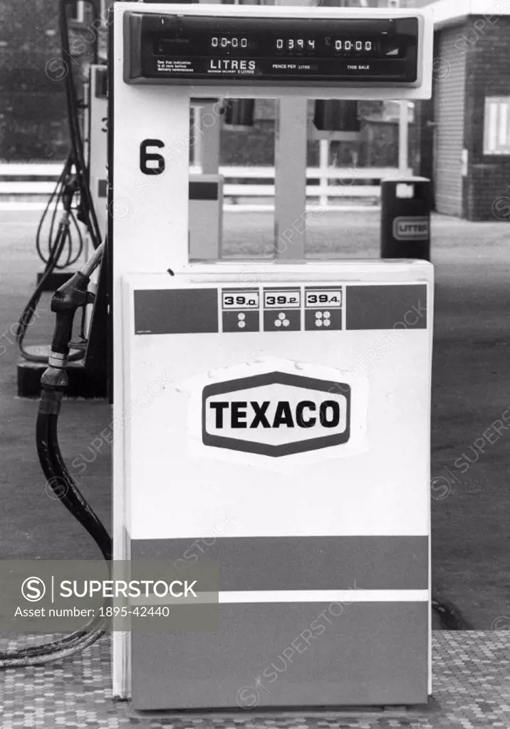 Petrol pump on the forecourt of a service station.