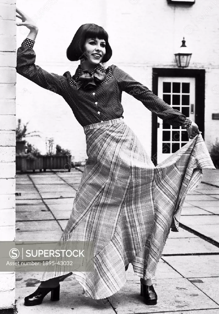 Fashion, Alan Thompson’s choice. Model, Elizabeth Taylor, wearing Maxi Swivel skirt in cotton £5.99. Polka dot cotton blouse, £2.49, both from Chelse...