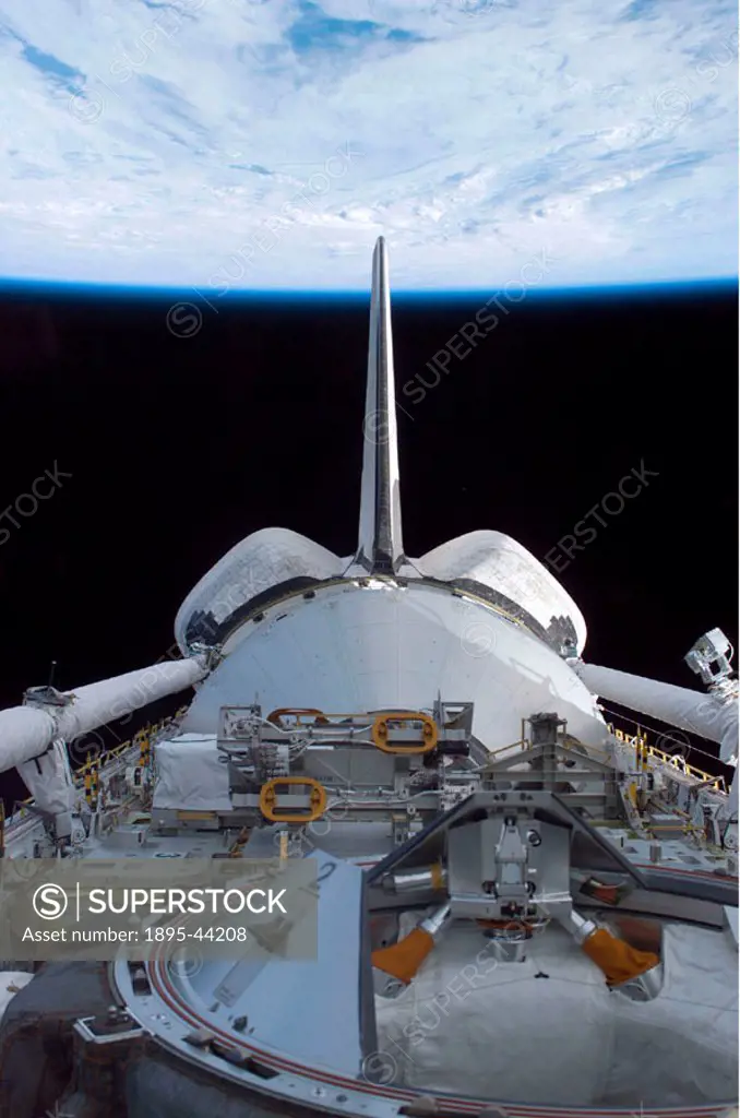 Discovery´s cargo bay over Earth´s horizon was photographed by one of the seven STS-114 crew members as the Shuttle approached the International Space...