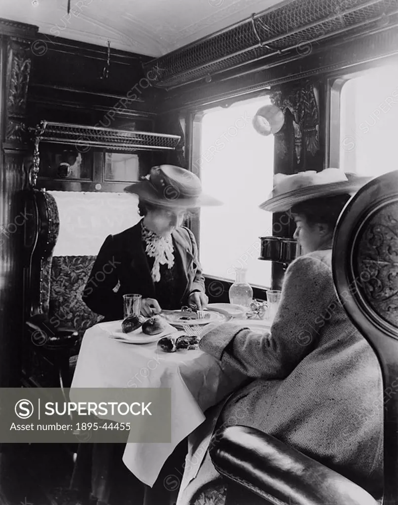 Two female passengers eating a meal in a LNWR dinning carriage