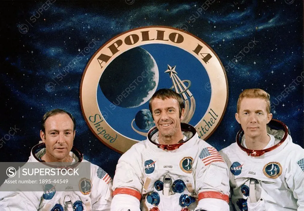 Apollo 14 astronauts and mission emblem, December 1970 Astronauts Edgar Mitchell left, Al Shepard and Stuart Roosa were the crew for the third success...