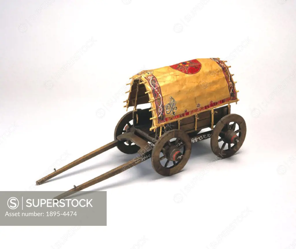 Medieval four-wheeled horse-drawn chariot.