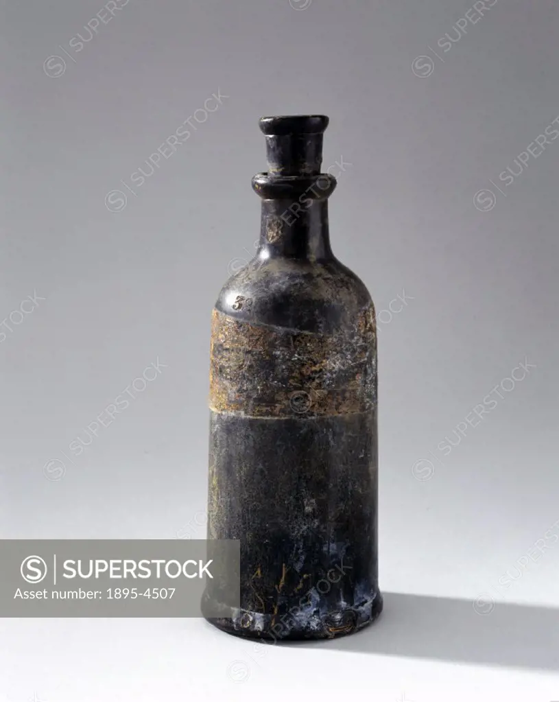 This bottle, shown with its stopper, was used for containing hydrofluoric acid (HF), a substance so corrosive that it attacks glass. It is 10 1/2 inch...