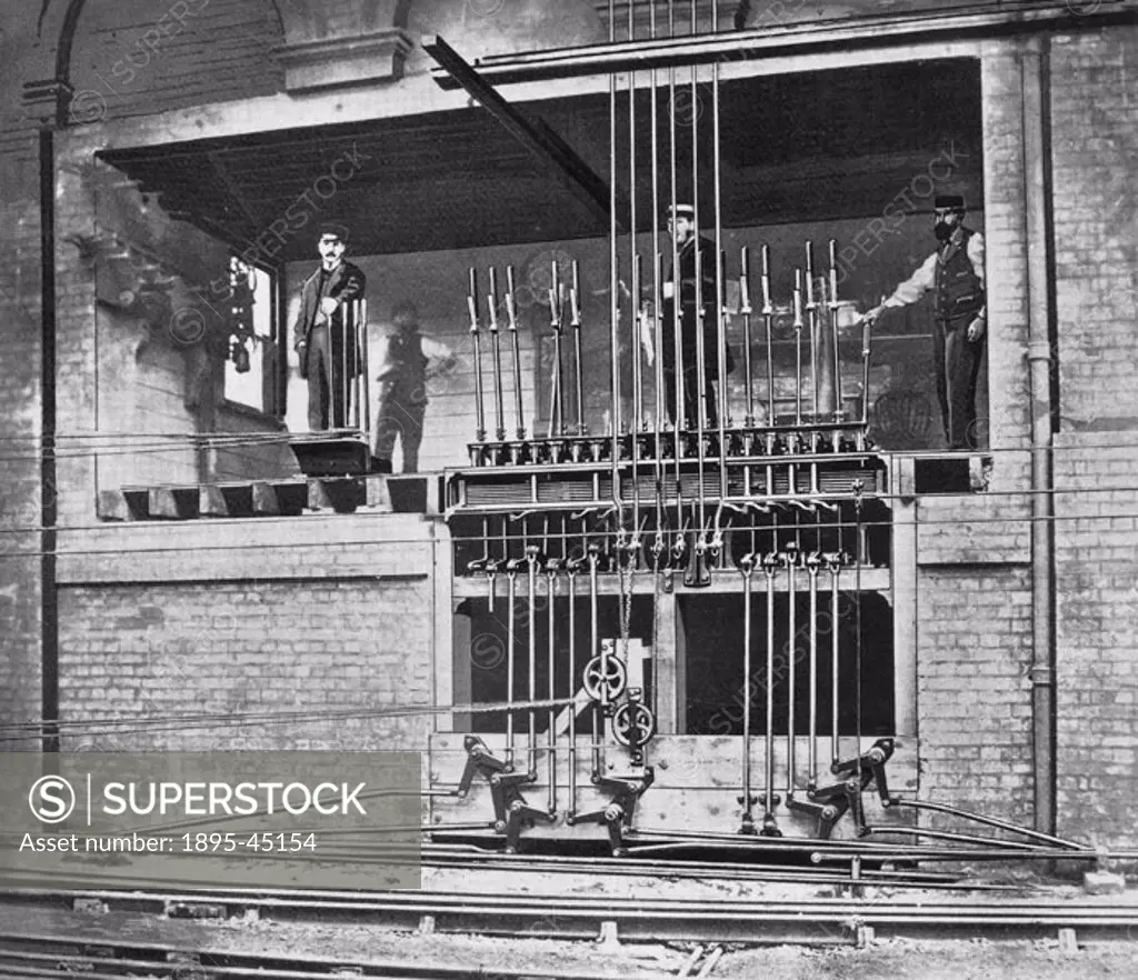 London, Brighton & South Coast Railway signal box at Victoria Station, Pimlico, London, named the hole-in-the-wall’. This image appears to be a photo...