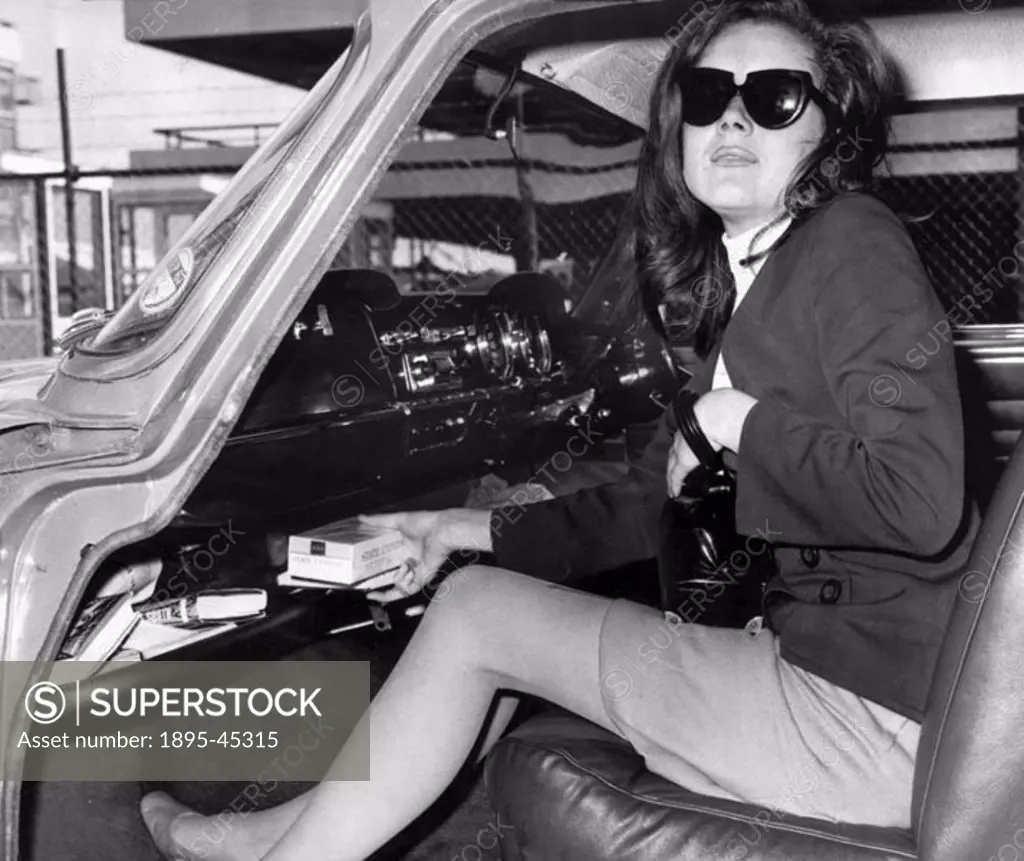 The return of an Avenger - in mini-skirt and sunglasses. It’s Diana Rigg - Mrs Emma Peel in the TV series - arriving at London Airport from America. ...