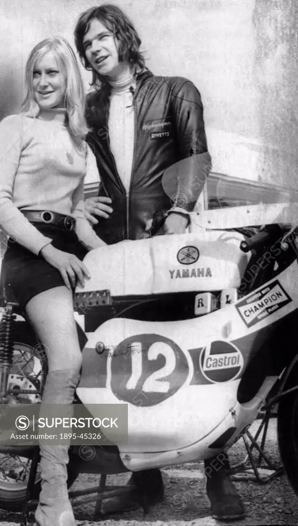 British motorcyclist and dual winner Sheene poses with his Yamaha bike.