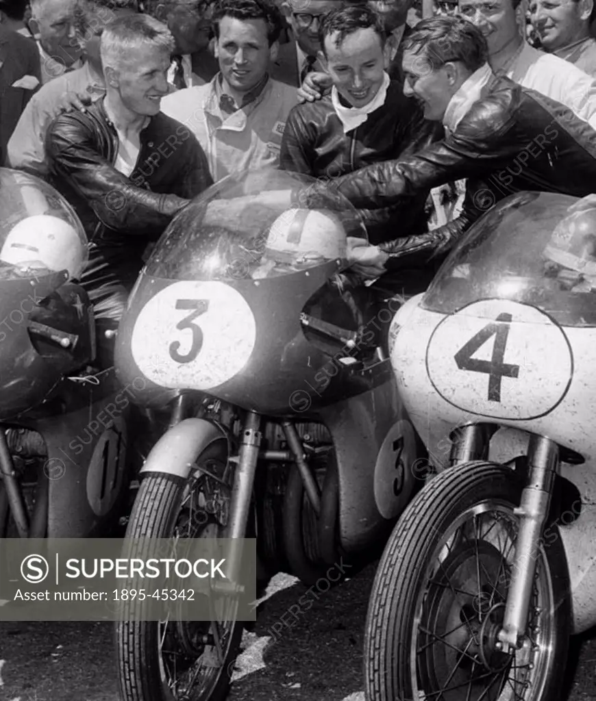 Left to right: J Hartle (second), J Surtees (winner) and Mike Hailwood (third). The world-famous TT (Tourist Trophy) Motorcycle Races have been held o...