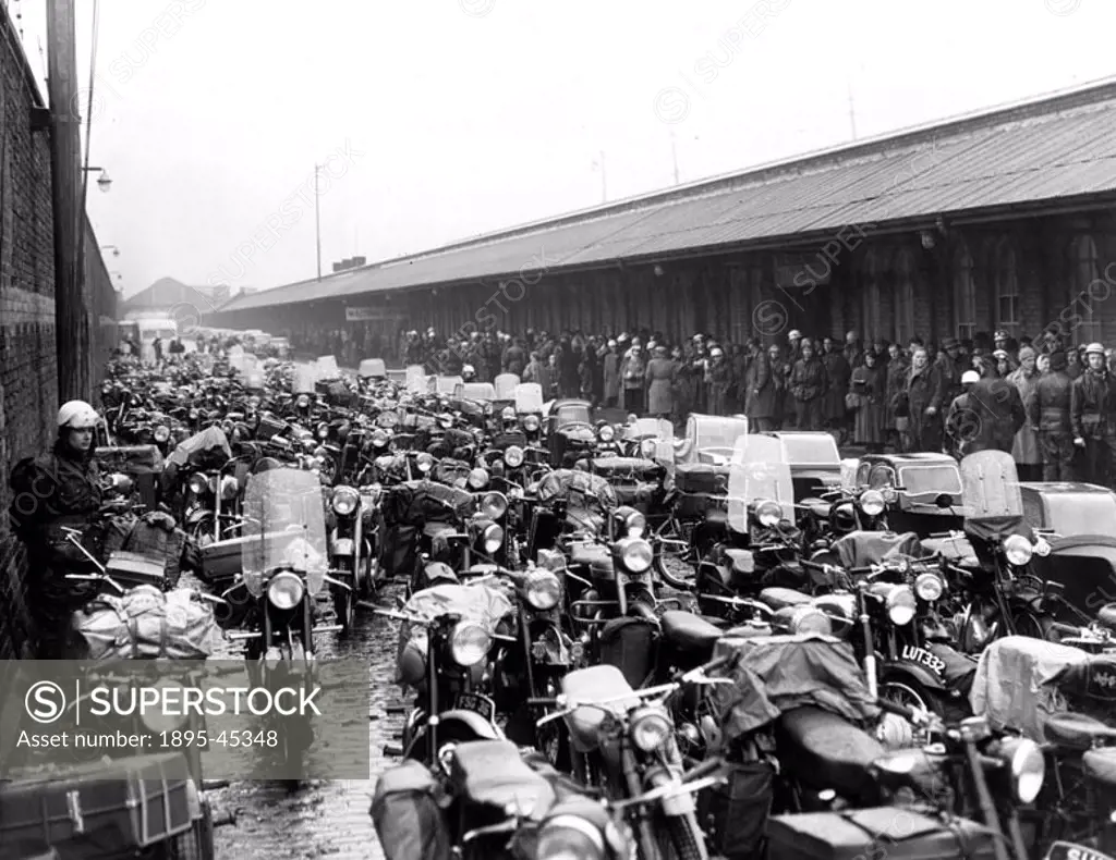 Scenes at Princes Parade and landing stage as motorcycles line up waiting to go on the Isle of Man steamer.