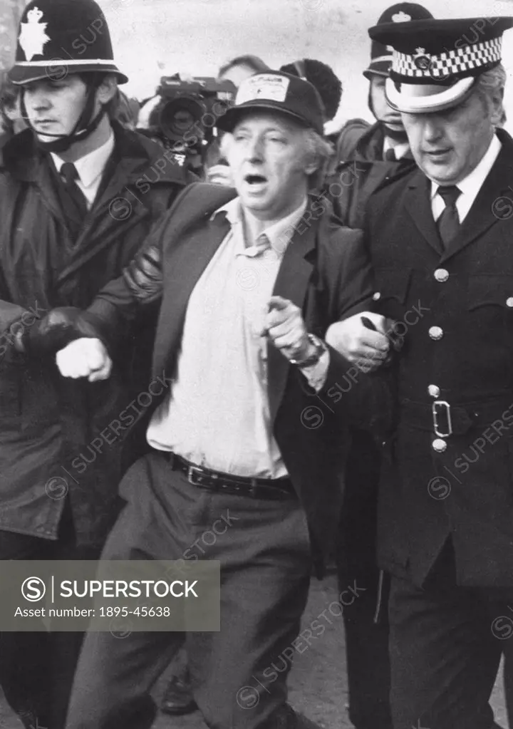 Arthur Scargill, leader of the National Union of Mineworkers, being arrested during the miners strike