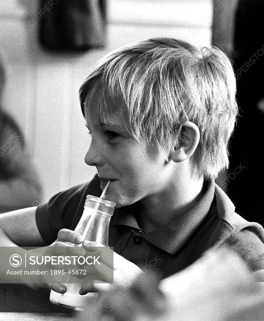 School milk, October 1971 Just like the old days again’  Christopher Chew, 9, drinks his third of a pint of milk at Ancoats School  Margaret Thatcher...