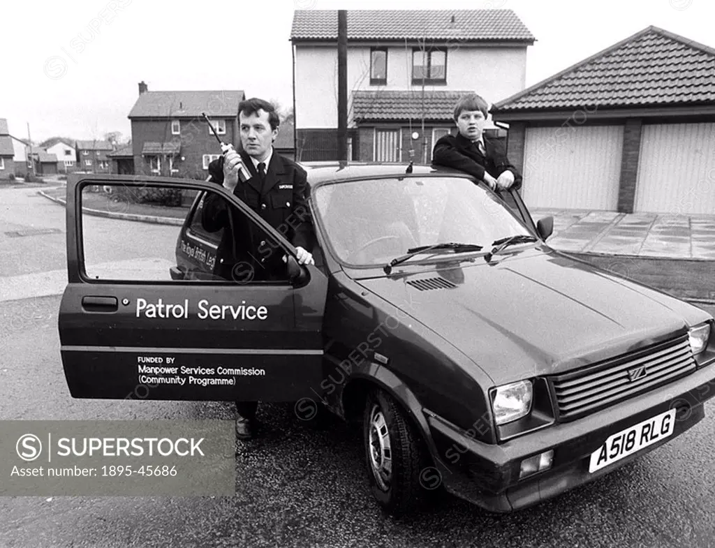 Vigilantes, January 1986 The new Cinnamon Brow, near Warrington: security senior patrolman Terry Rae and Michael Stokes with their van touring the st...