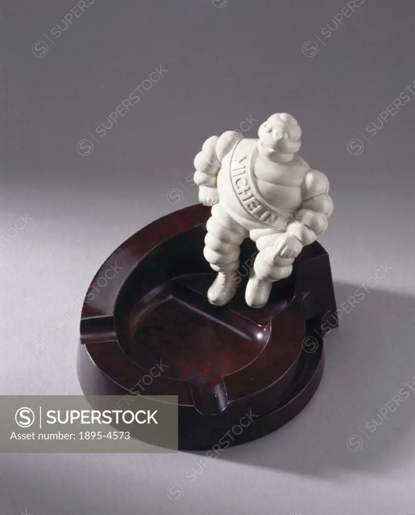 Made from walnut coloured Bakelite (Phenol formaldehyde), it has a ´Michelin´ man of ivory urea formaldehyde sitting on its edge and was made to promo...