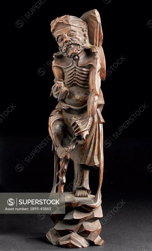 Figurine of a Taoist immortal, 1701-1900 Carved wooden statue of T´ieh-Kuai Li, one of the eight Taoist immortals who came back in form of a beggar  P...