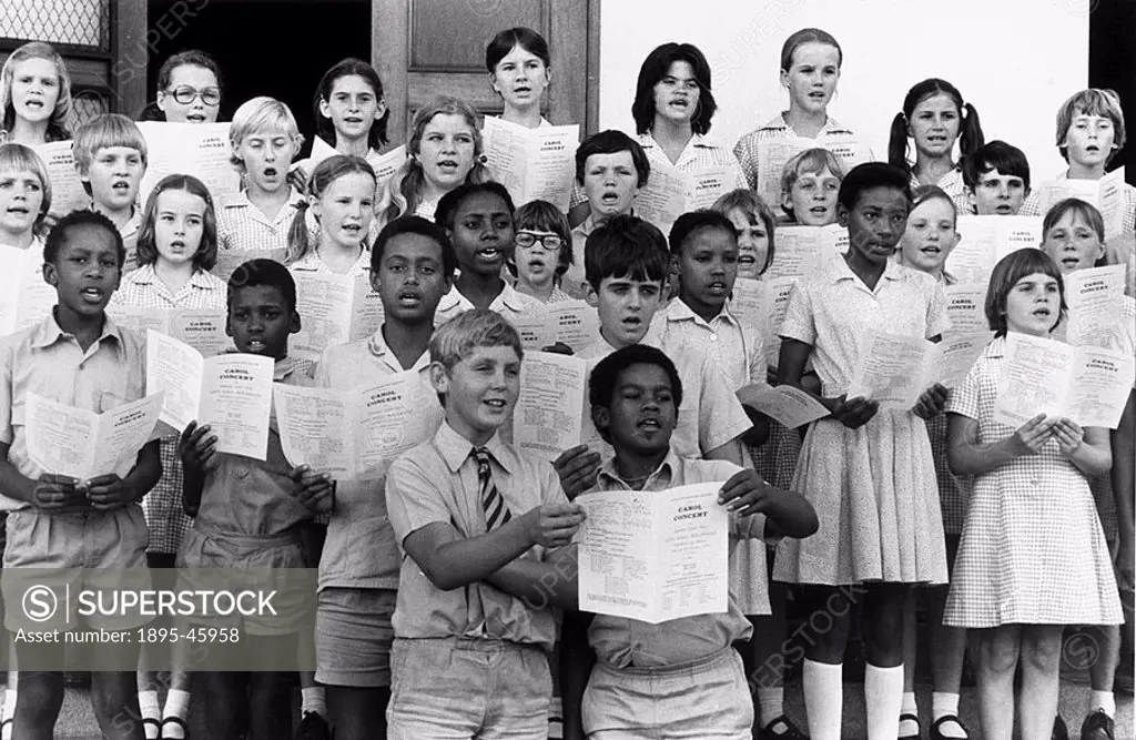 Children singing carols at Hugh Beadle School near Bulawayo  Rhodesia, a former British colony, became officially independent in 1979 and was re-named...