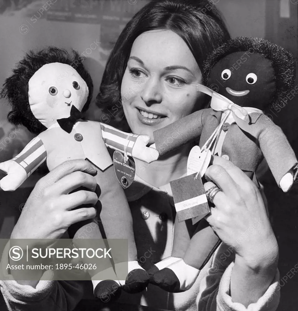 Jill Dent 24 of Harrogate holds the “Mr Smith” white golliwog and the traditional black golliwog’  The golliwog’ toy has widely fallen out of favour...