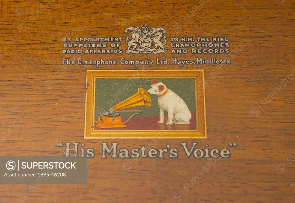 Close-up of the His Master´s Voice” logo on the top of a HMV monochrome television set
