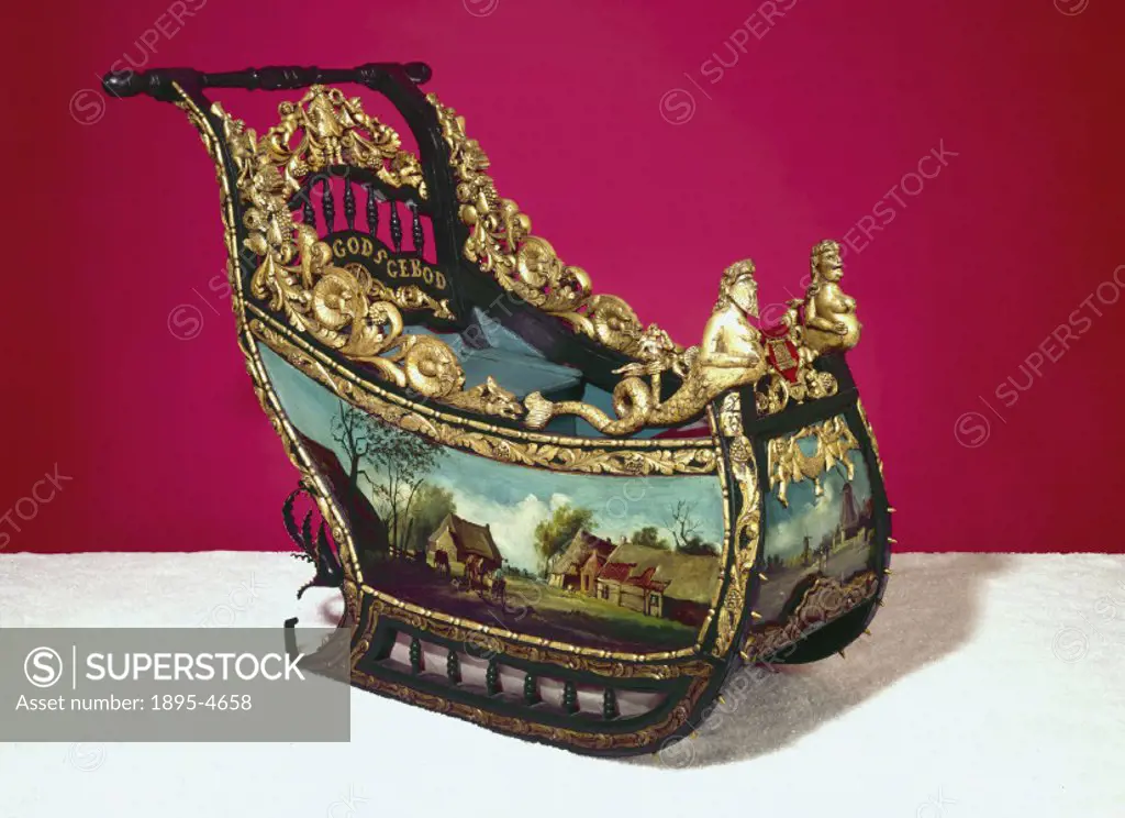 A sleigh in the form of a push chair, decorated with a view of an 18th Century Dutch farm.