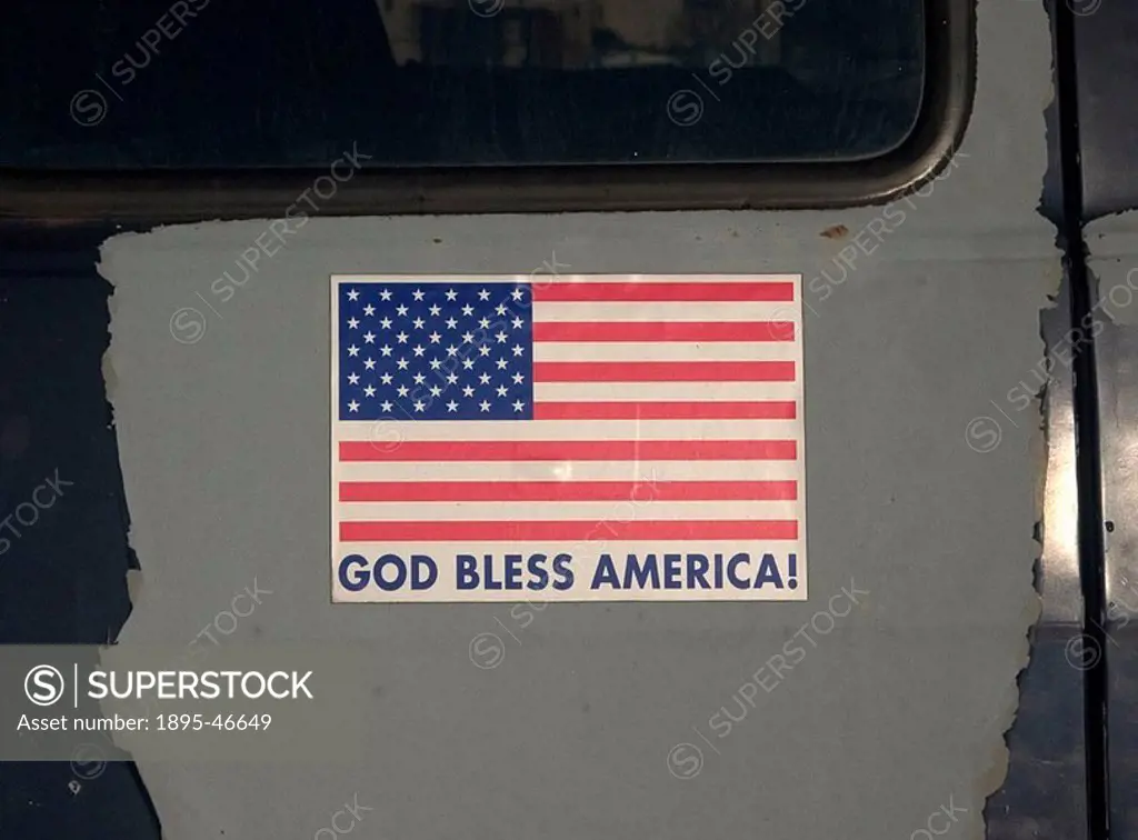 God Bless America’ sticker, New Jersey, USA, 2007  Photograph by Richard Bosomworth of a patriotic van sticker seen in a supermarket carpark