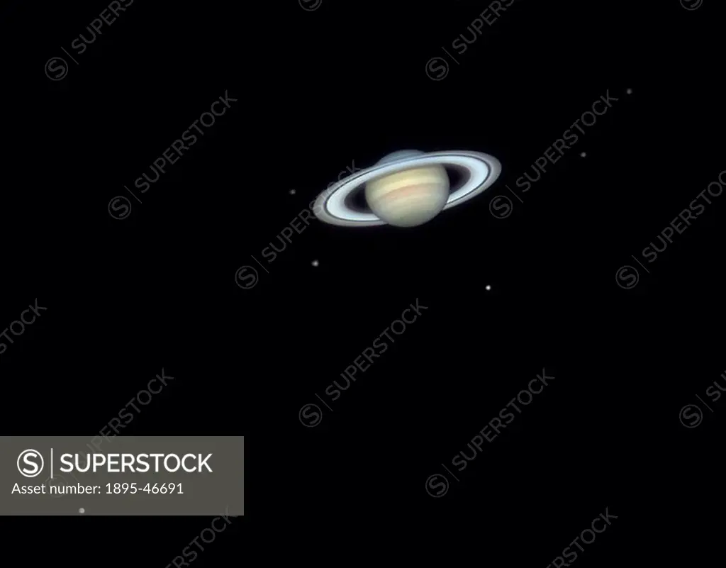 Saturn´s moons, 2006 This image showing Saturn with six of its moons was taken on 26 January 2006 at 22:11 hrs UT using a webcam attached to a 14-inch...