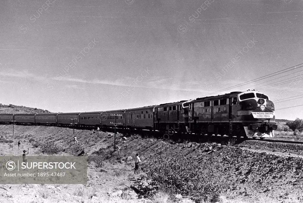 The Indian-Pacific trains inaugural run, Australia, May 1970 Outback dwellers wave at the coast-to-coast Sydney-Perth service rolling through the scr...