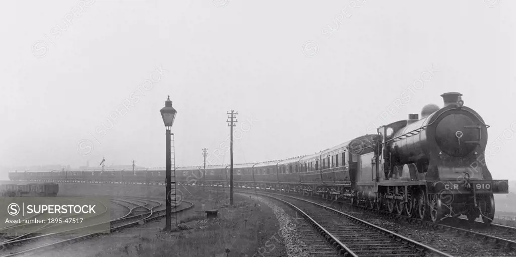Caledonian Railway passenger train CR 4-6-0 steam locomotive number 910 on a passenger train 