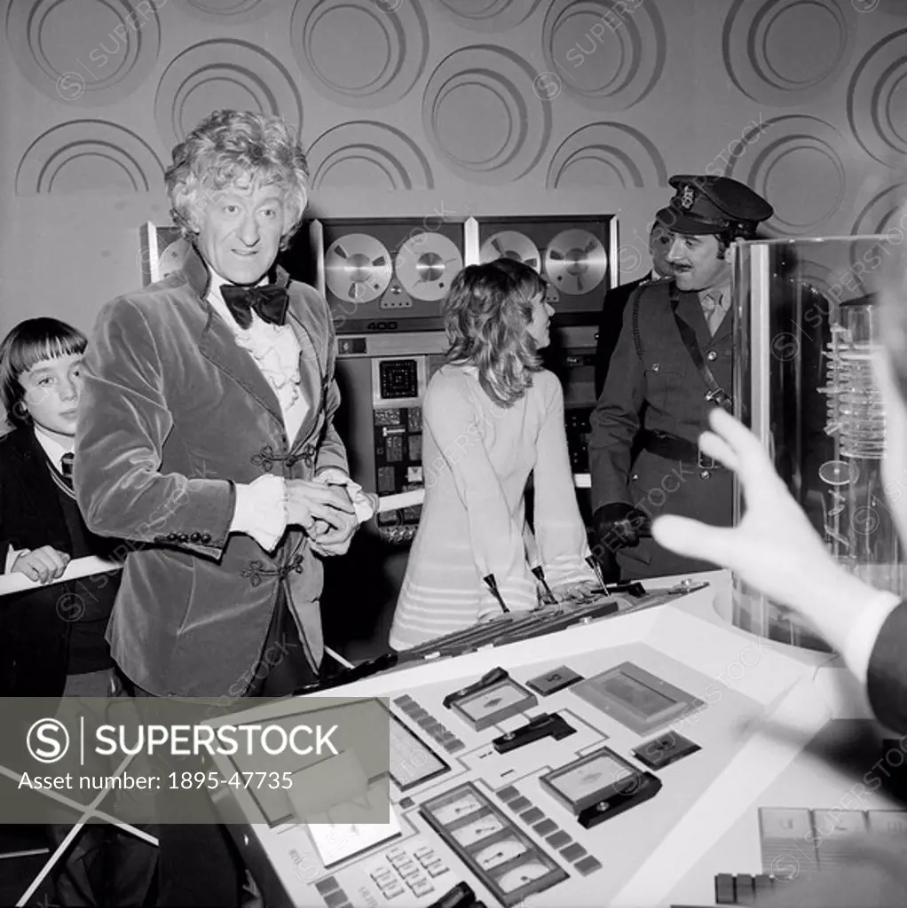 Jon Pertwee at the Science Museum, December 1972 Doctor Who cast members Jon Pertwee, Katy Manning and Nicholas Courtney in character at the opening o...