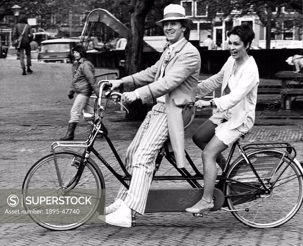 Peter Davison and Janet Fielding, the new Dr Who and assistant, May 1982 British actor Peter Davison in Victorian cricketing gear, riding round Amster...