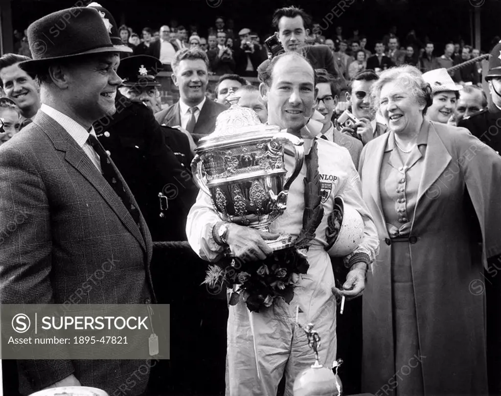 Stirling Moss, English racing driver, April 1960.After the race. Stirling Moss born 1929 won many major races in the 1950s, including the British Gran...
