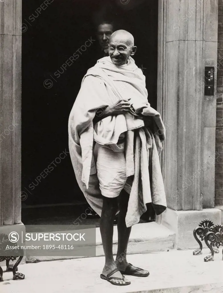 Mahatma Gandhi on the steps of 10 Downing Street, 1931.Gelatin silver print. Gandhi 1869_1948 travelled to Britain in 1931 in order to attend the Seco...
