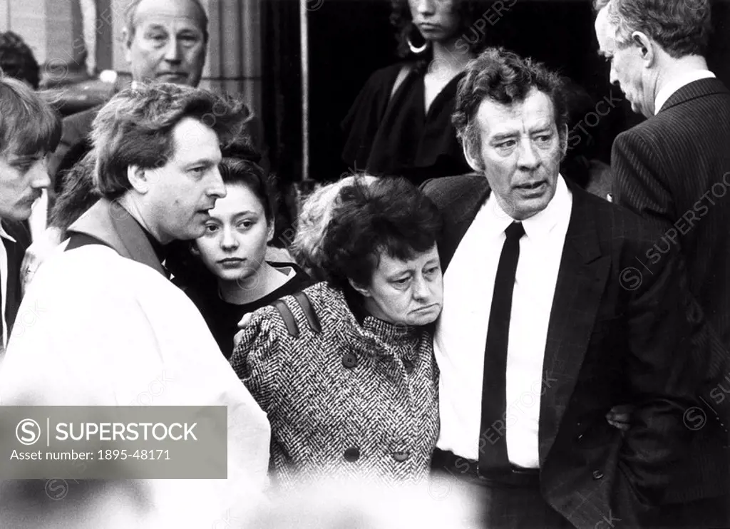 Parents of a football fan killed at Hillsborough, 19 April 1989.Gary Churchs father David comforts his wife Maureen outside Christ Church, Waterloo, ...
