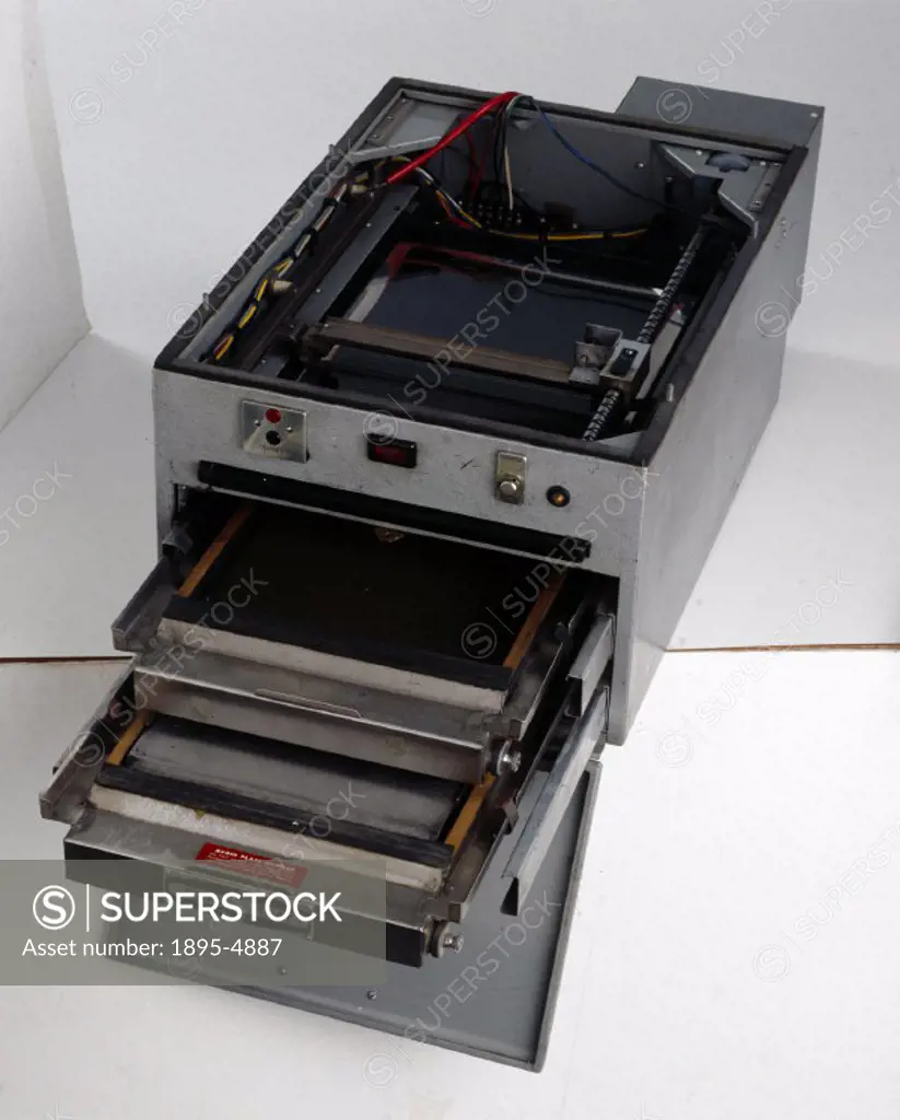 This early Xerox Copier uses the attraction of opposite electric charges to reproduce words and images. Inside the copier, a metal plate coated with s...