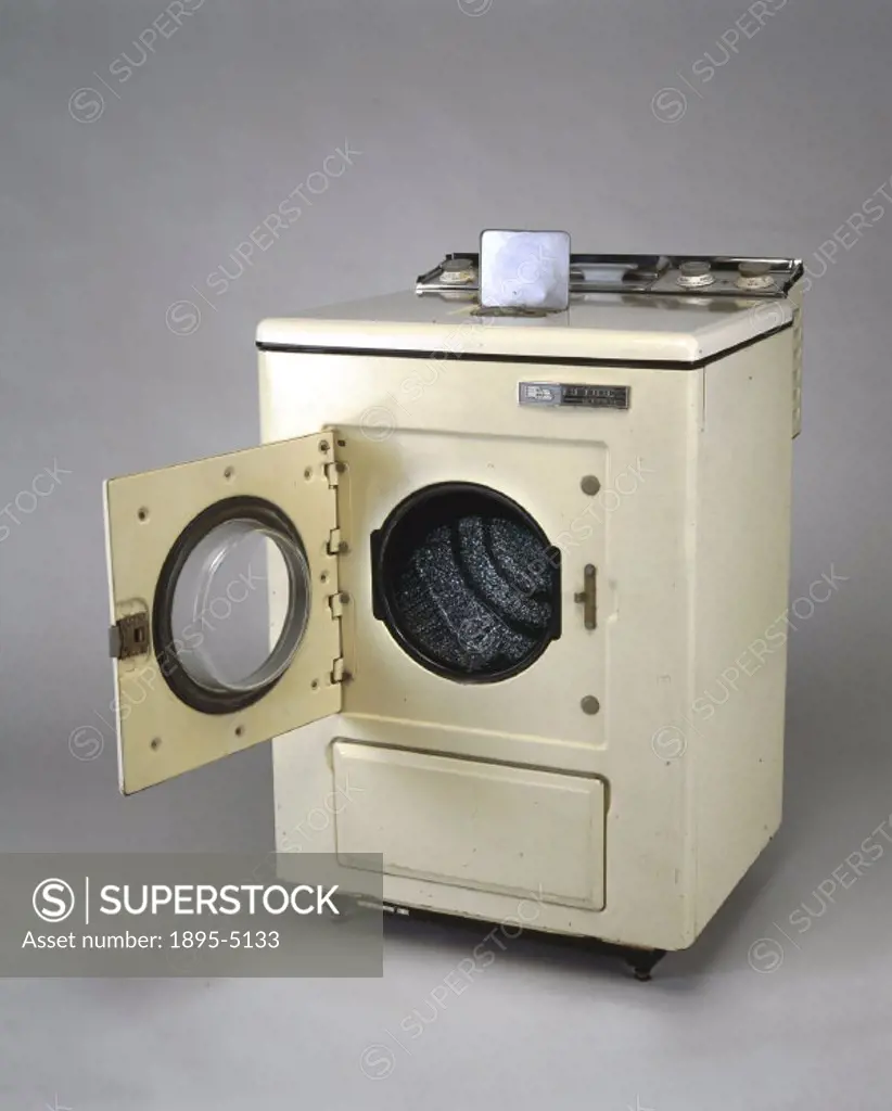 The first electric washing machine was invented by the American Alva J Fisher and introduced in 1908. Three-quarter view, with door open.